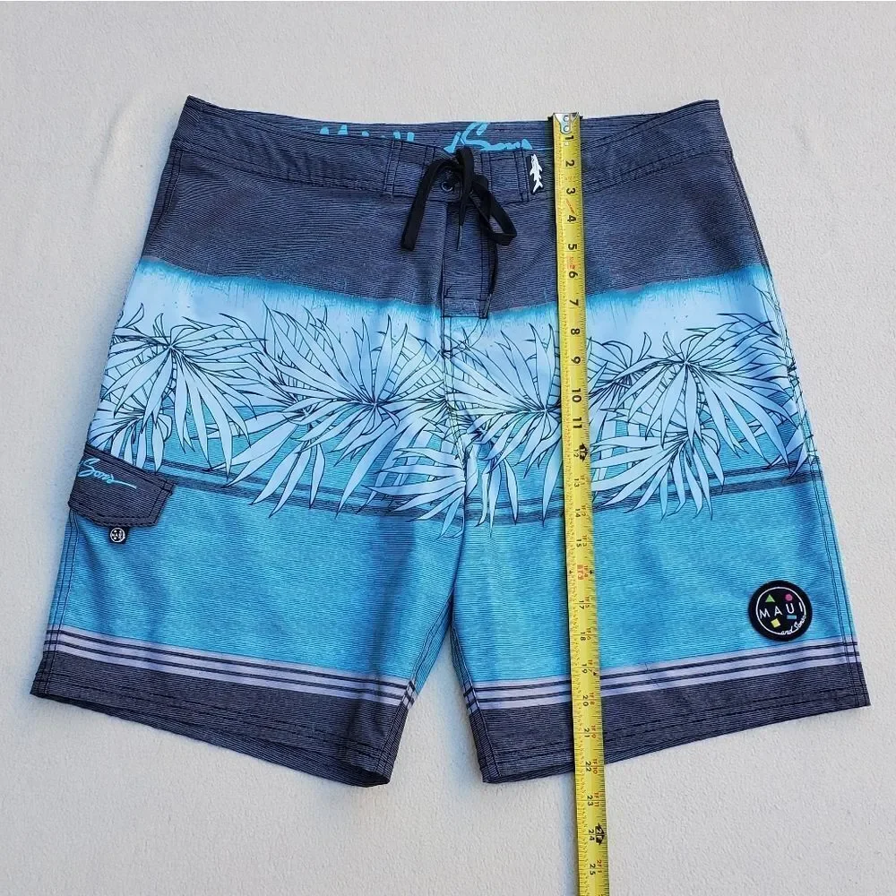 Maui and Sons blue gray and black board shorts